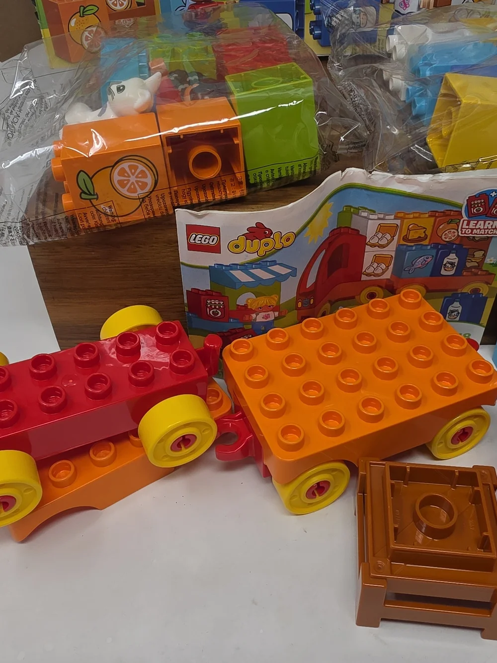 Lego Duplo Red and Yellow Toy Delivery Truck with Blue Blocks